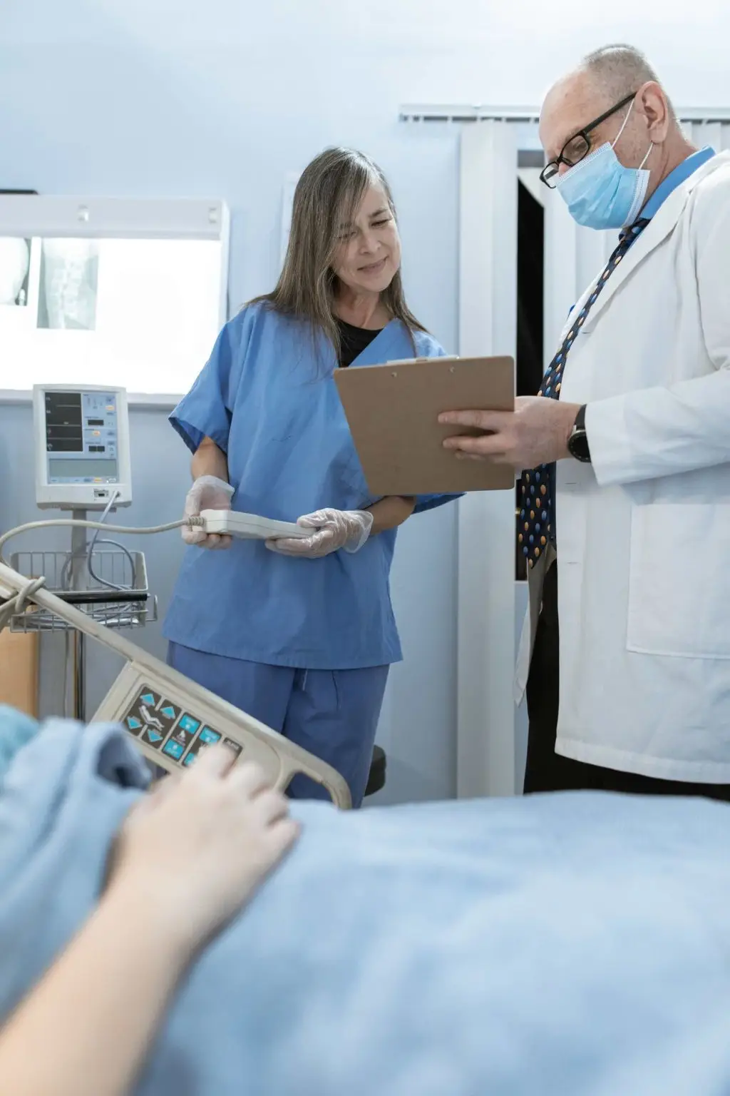 nurse and doctor helping patient in toronto hopsital